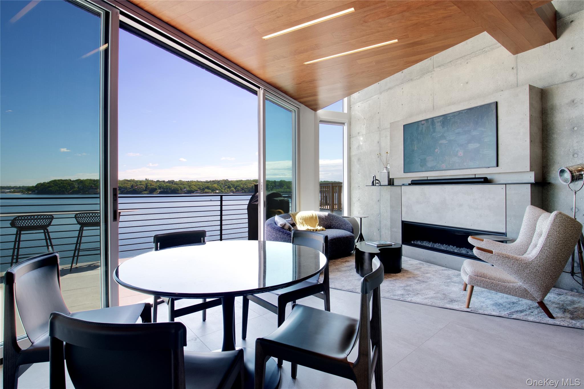 75-34 West Shore Road, Unit 34 Port Washington, NY 11050 - Photo 3 of 22 Main level living area