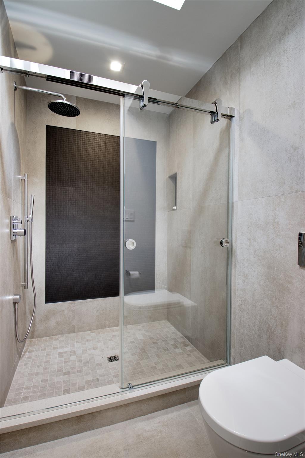 75-34 West Shore Road, Unit 34 Port Washington, NY 11050 - Photo 9 of 22 Full bathroom, main level