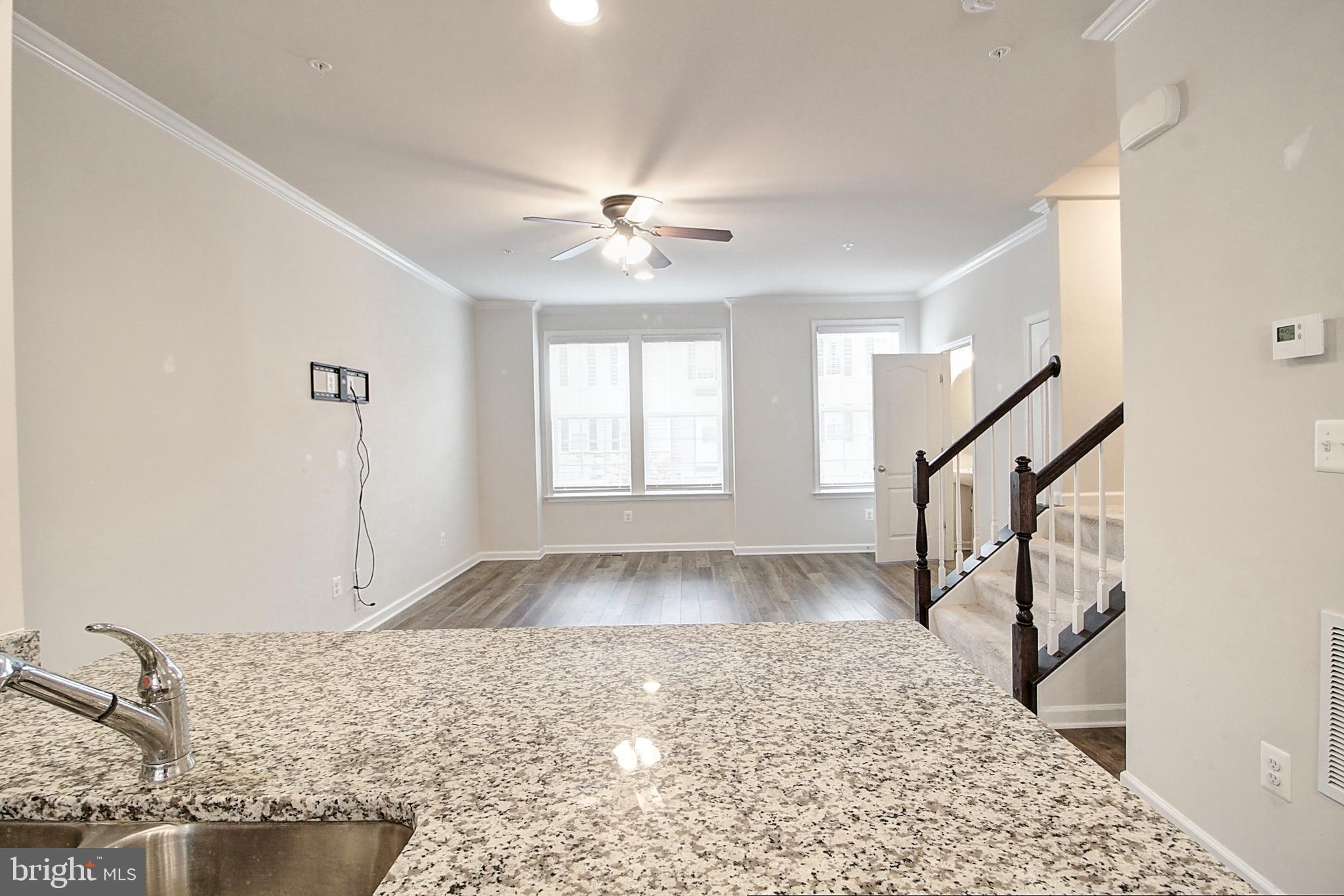 304 Spring Bank Way Frederick, MD 21701 - Photo 7 of 27 a view of an empty room and window