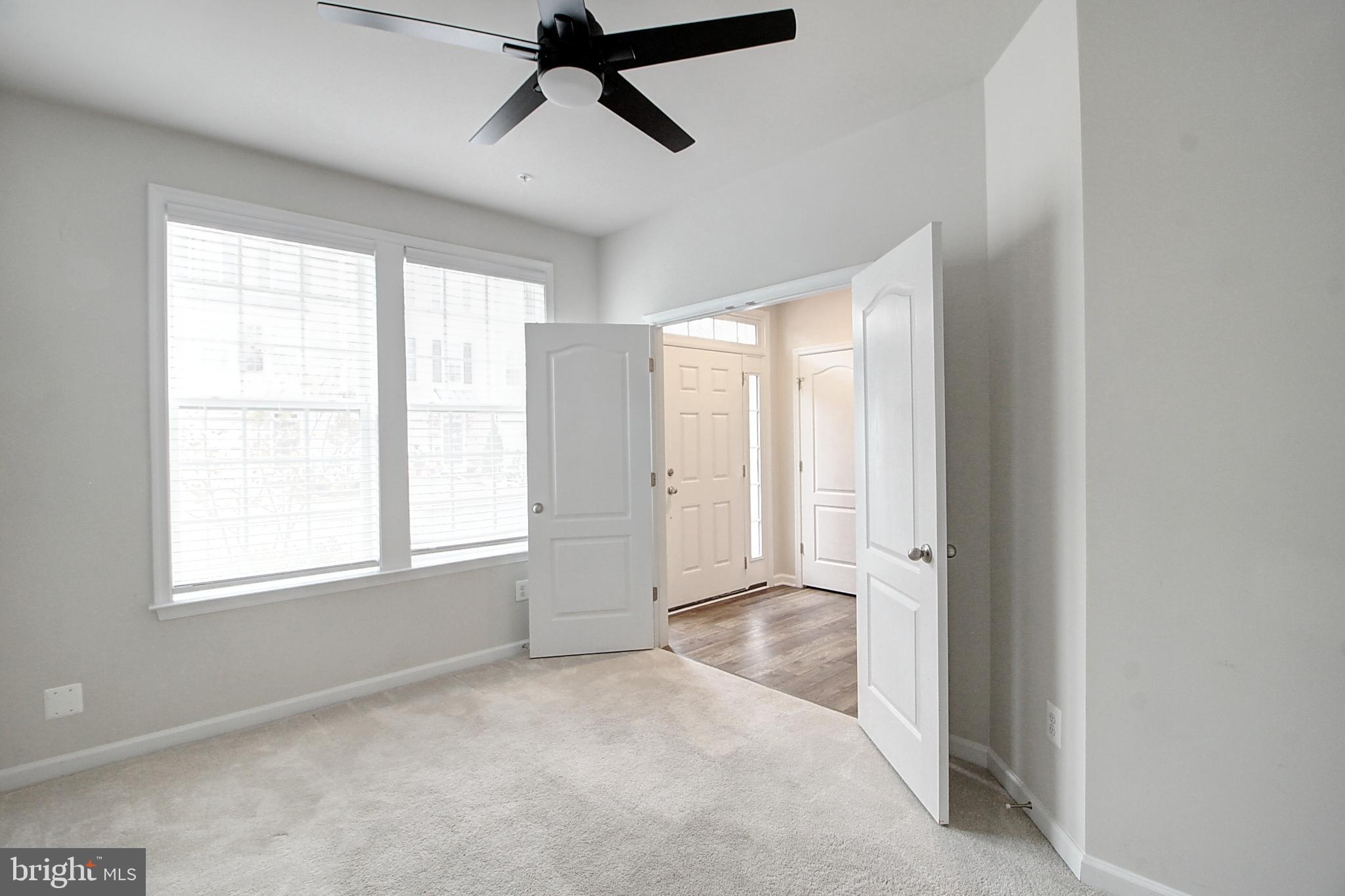 304 Spring Bank Way Frederick, MD 21701 - Photo 10 of 27 an empty room with windows and closet