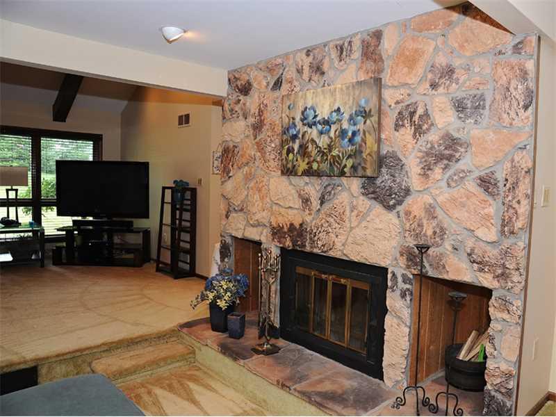 Other. sunken sitting room with log burning fireplace