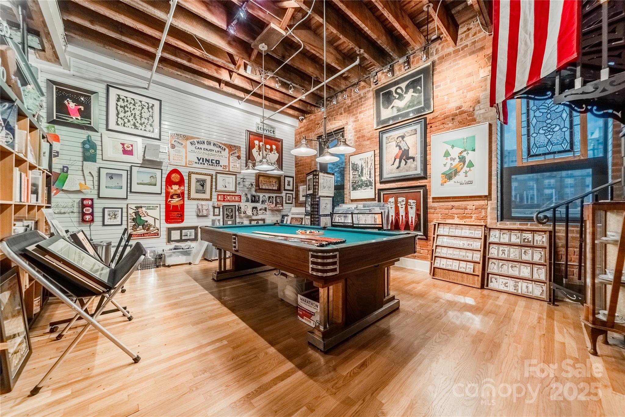 a view of a chairs and a table in the patio
