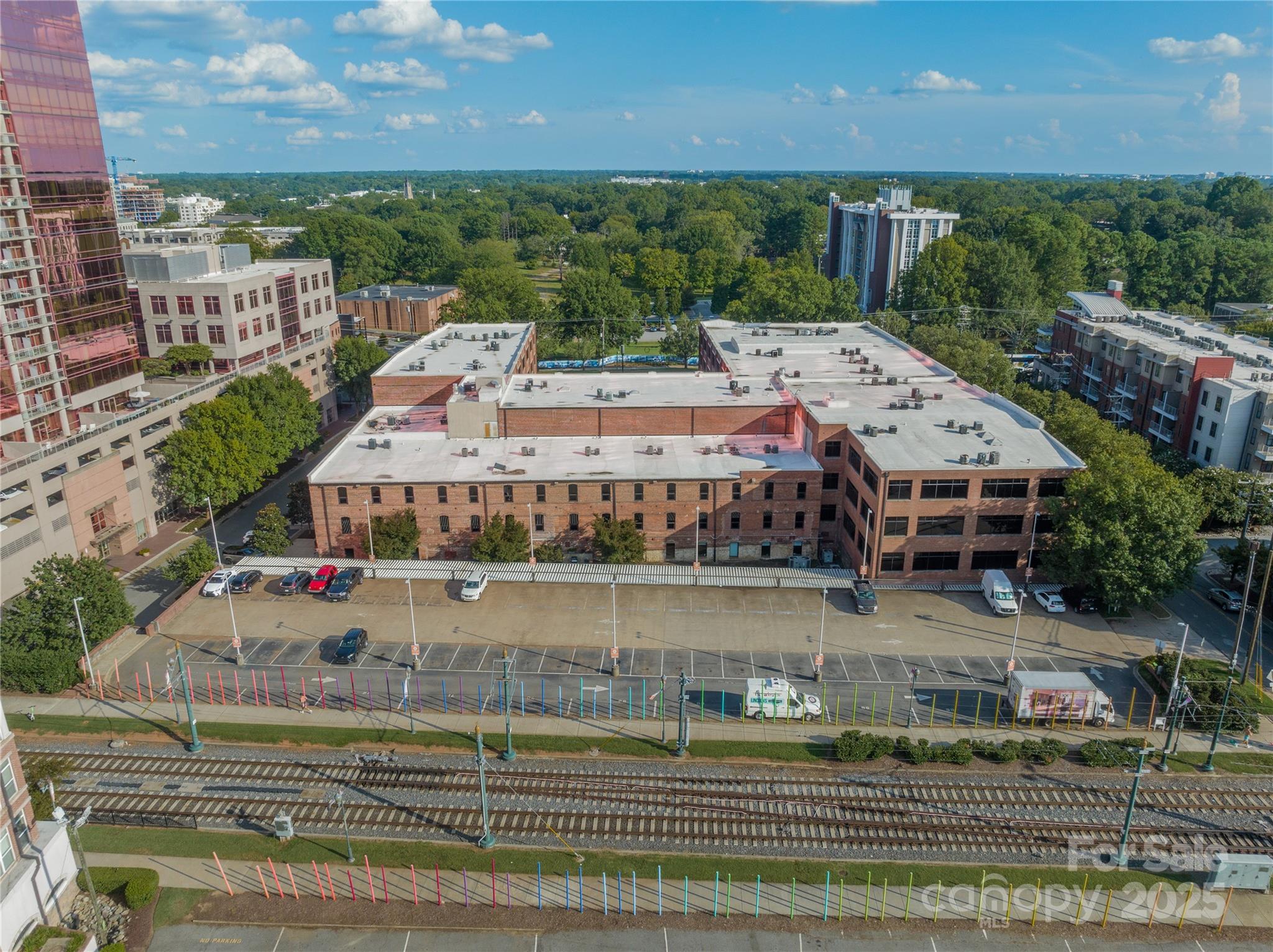 310 Arlington Avenue, Unit MULTIPLE Charlotte, NC 28203 - Photo 6 of 13 a aerial view of a house with a garden and outdoor space