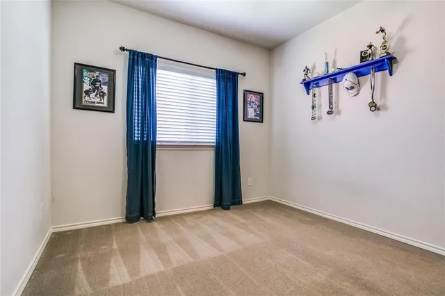 a view of empty room with windows