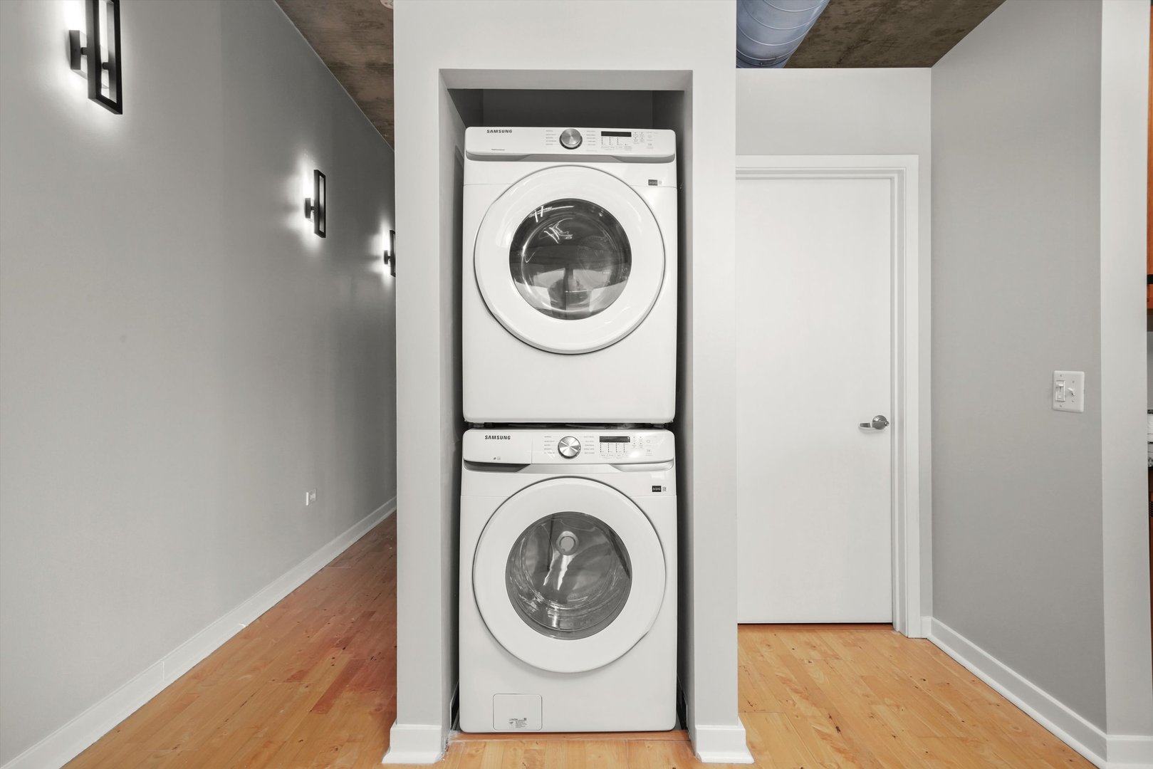 50 East 16th Street, Unit 414 Chicago, IL 60616 - Photo 20 of 26 a utility room with dryer and washer