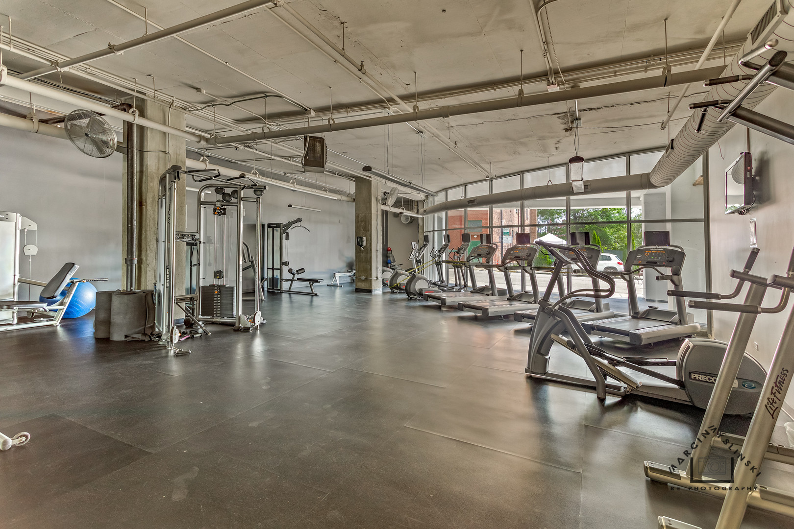 50 East 16th Street, Unit 414 Chicago, IL 60616 - Photo 25 of 26 a view of a room with gym equipment