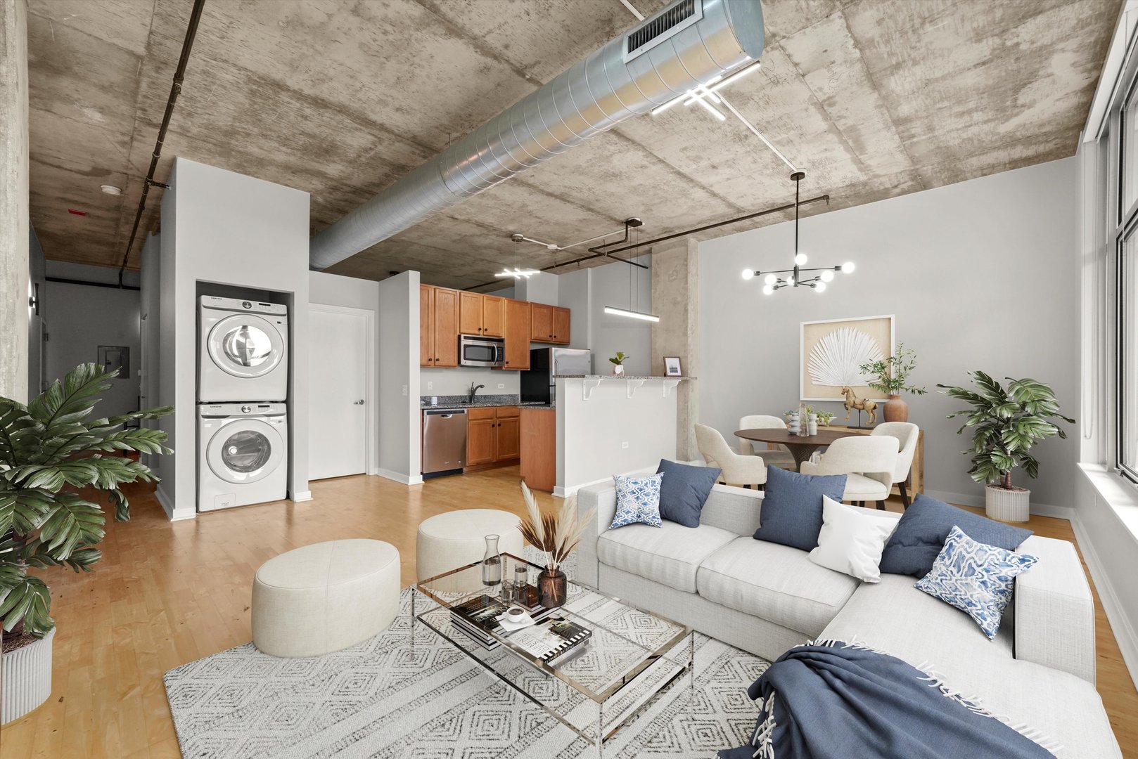 50 East 16th Street, Unit 414 Chicago, IL 60616 - Photo 6 of 26 a living room with furniture and a chandelier