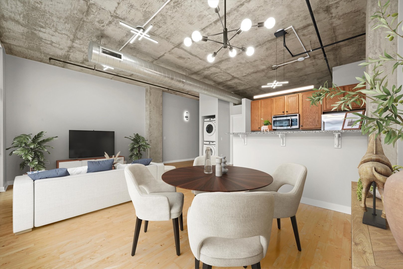 50 East 16th Street, Unit 414 Chicago, IL 60616 - Photo 8 of 26 a view of a dining room with furniture and wooden floor