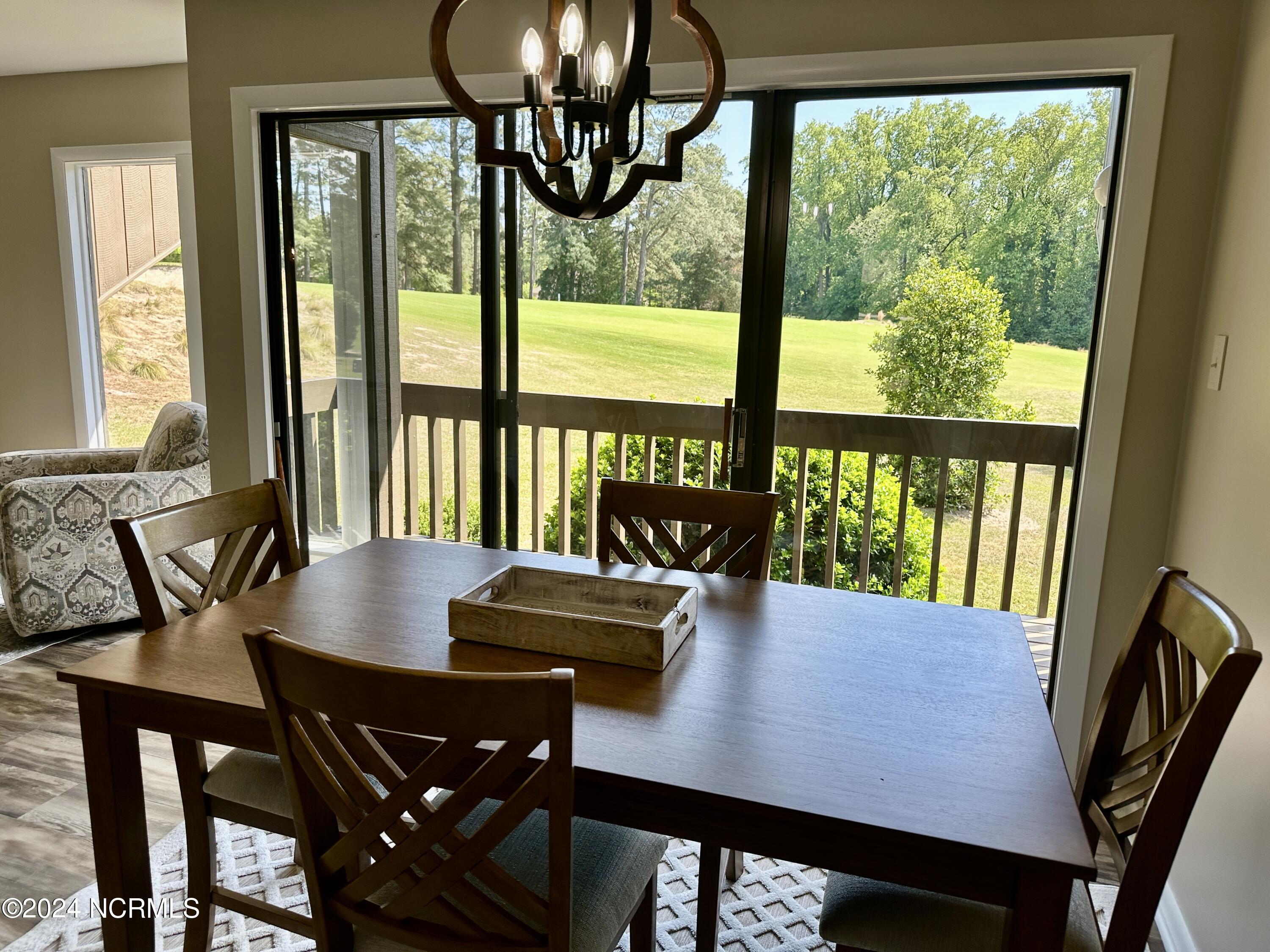 85 Pine Valley Road, Unit 29 Pinehurst, NC 28374 - Photo 7 of 36 The new dining table is perfect for entertaining