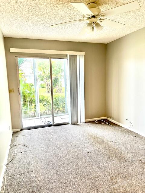 338 Fanshaw I Boca Raton, FL 33434 - Photo 6 of 28 a view of an empty room with a window