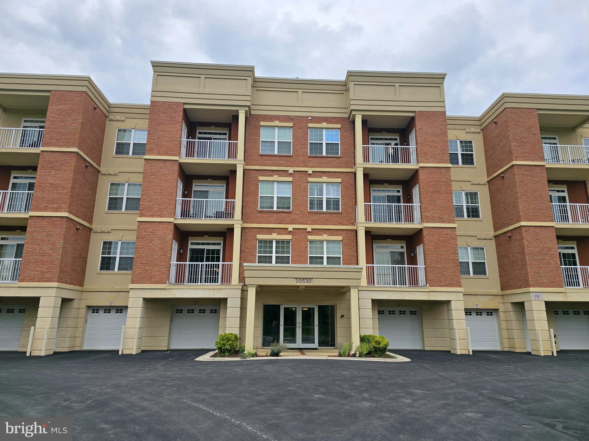 a front view of a building with balcony