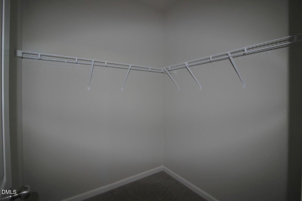 349 Great Northern Station Apex, NC 27502 - Photo 13 of 20 a view of an empty walk in closet