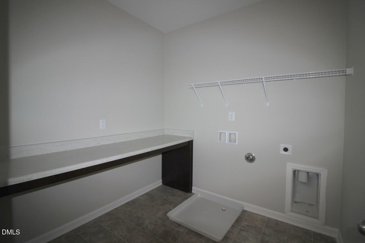 349 Great Northern Station Apex, NC 27502 - Photo 17 of 20 a view of an empty walk in closet