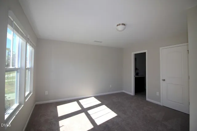 a view of an empty room and window