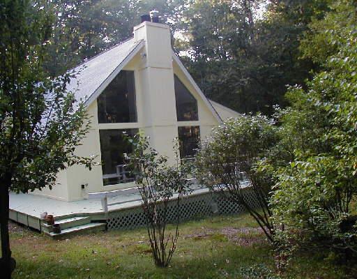 1 Garden Road Weston, CT 06883 - Photo 1 of 1 a view of backyard of house and trees