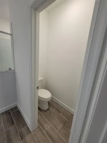 a bathroom with a toilet and a sink