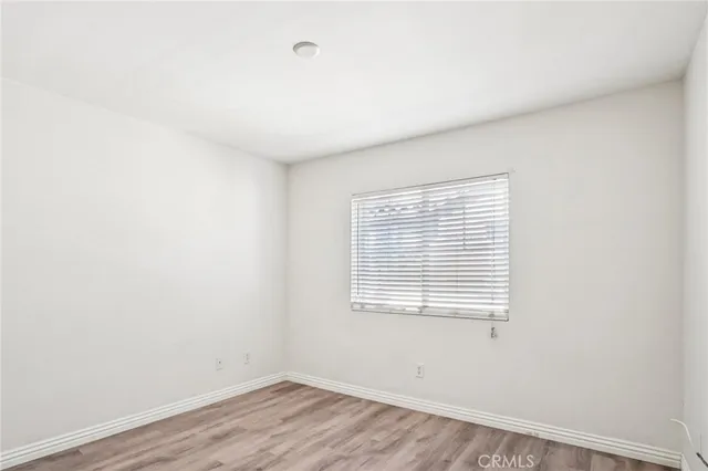 a view of a room that has a window in it