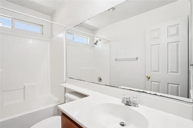 a bathroom with a sink and a bathtub
