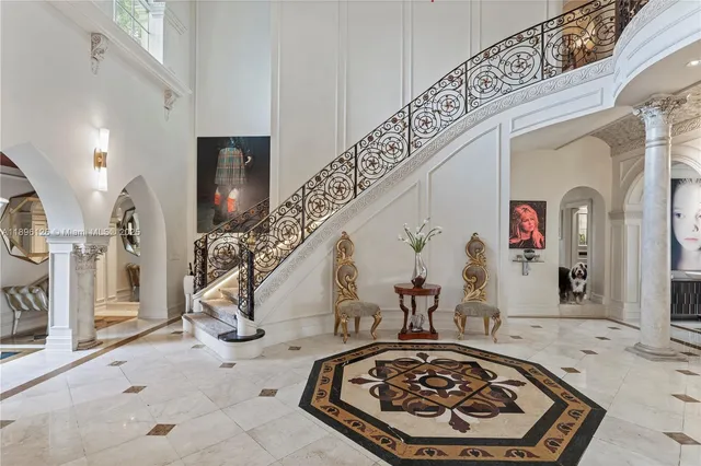 a living room with fireplace furniture and a flat screen tv