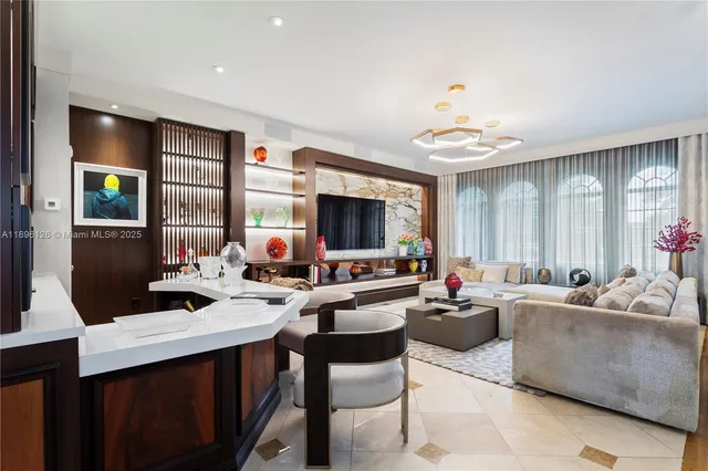 a kitchen with a table and chairs