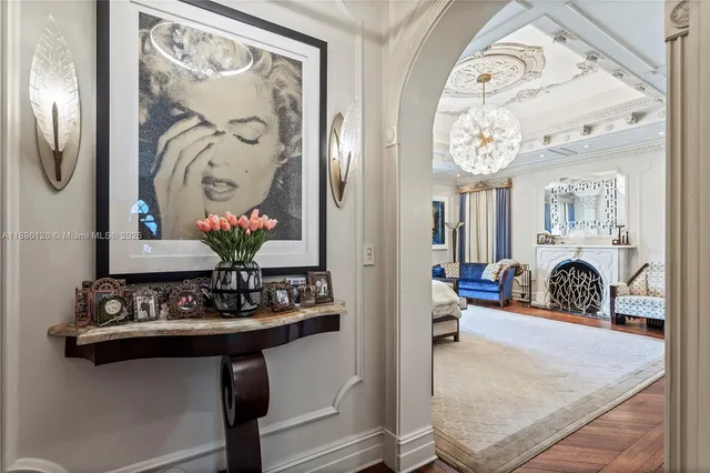 a bedroom with furniture and wooden floor