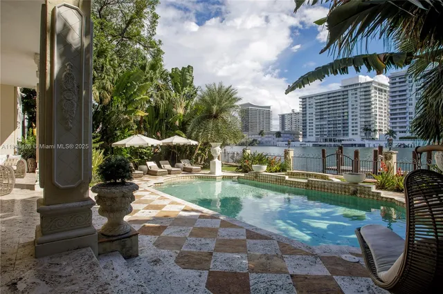 a view of a swimming pool with an outdoor space
