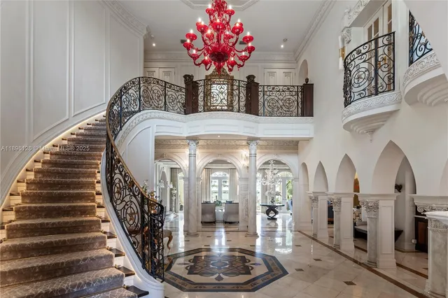 a view of a living room and a chandelier