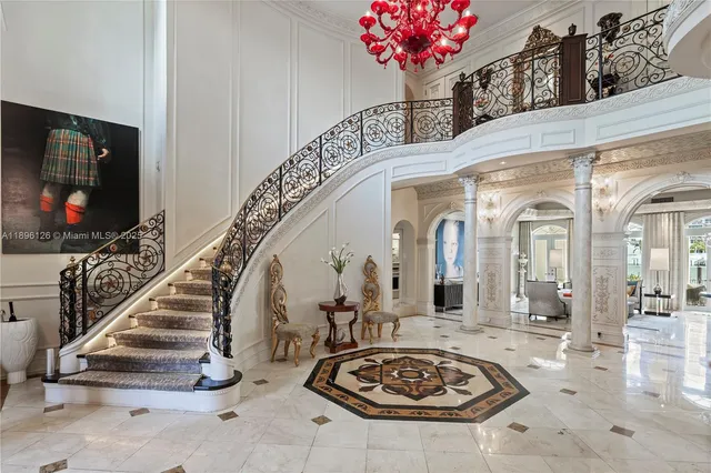 a view of a kitchen with fridge and stove