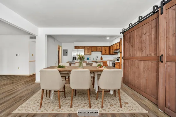 a view of a dining room with furniture