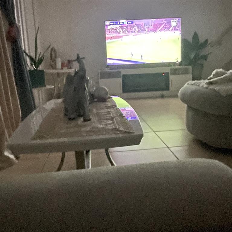 6728 Southwest 40th Street, Unit 6728 Fort Lauderdale, FL 33314 - Photo 13 of 13 a bathroom with a sink and a mirror
