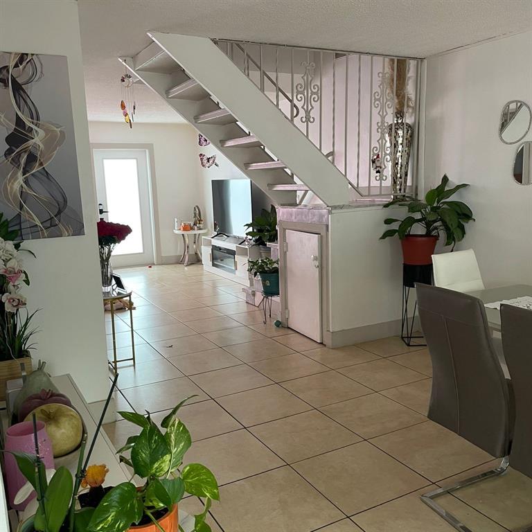 6728 Southwest 40th Street, Unit 6728 Fort Lauderdale, FL 33314 - Photo 2 of 13 a view of entryway and hall