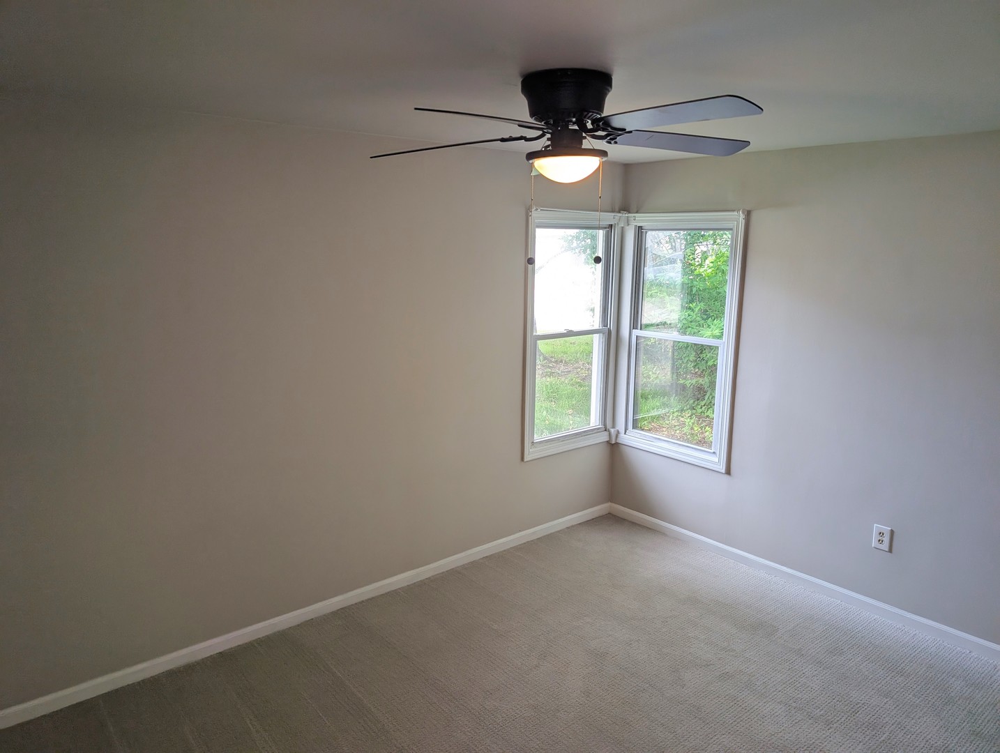 950 North Brainard Street Naperville, IL 60563 - Photo 7 of 9 a view of an empty room with a window