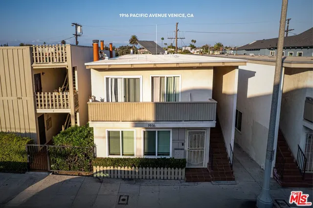 a view of a house with a roof deck