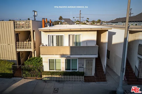 a view of a house with a roof deck