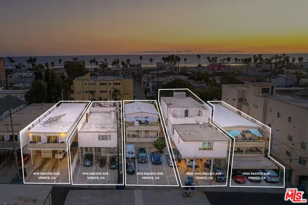 an aerial view of a multi story parking building
