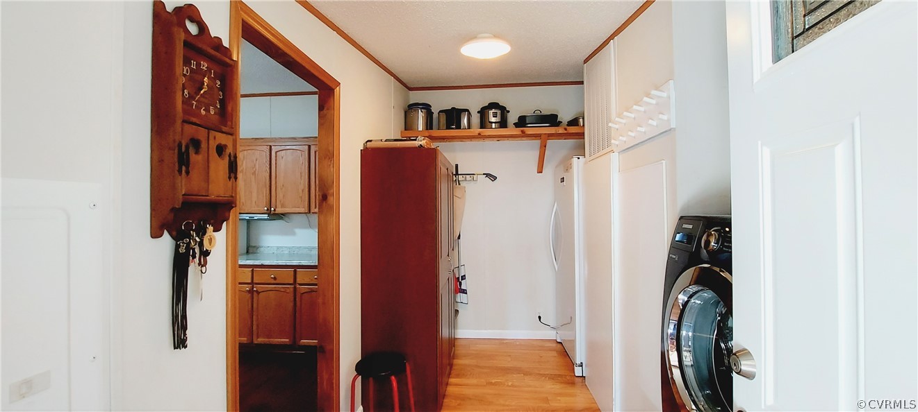 1722 Mallory Road Kents Store, VA 23084 - Photo 26 of 37 a view of walk in closet with clothes and shoes