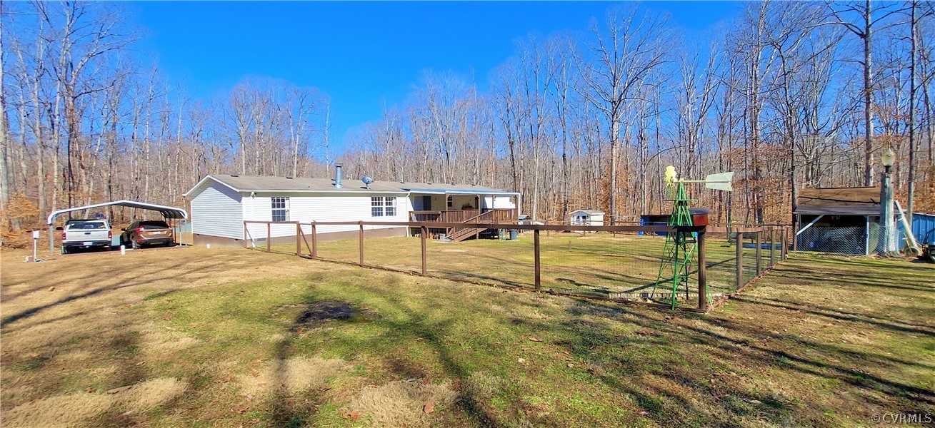 1722 Mallory Road Kents Store, VA 23084 - Photo 35 of 37 a sign board with yard in the back