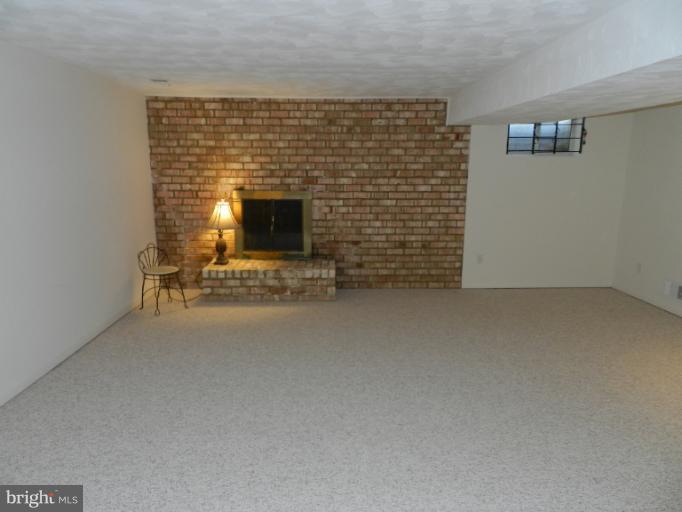 4022 Winlee Road Randallstown, MD 21133 - Photo 15 of 17 Wood Brick Burning Fireplace
