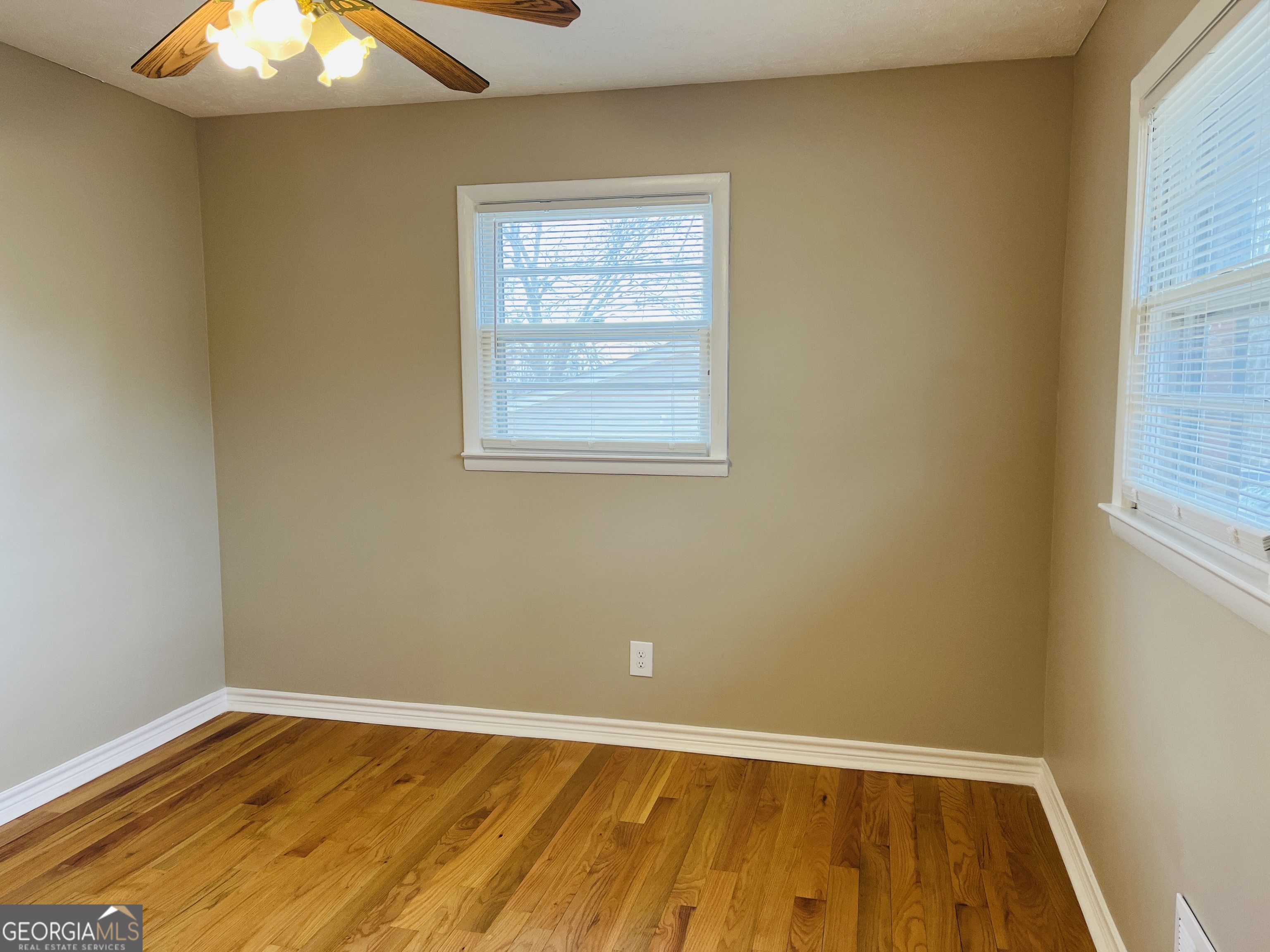 1085 Horsley Mill Road Carrollton, GA 30116 - Photo 19 of 26 an empty room with a window