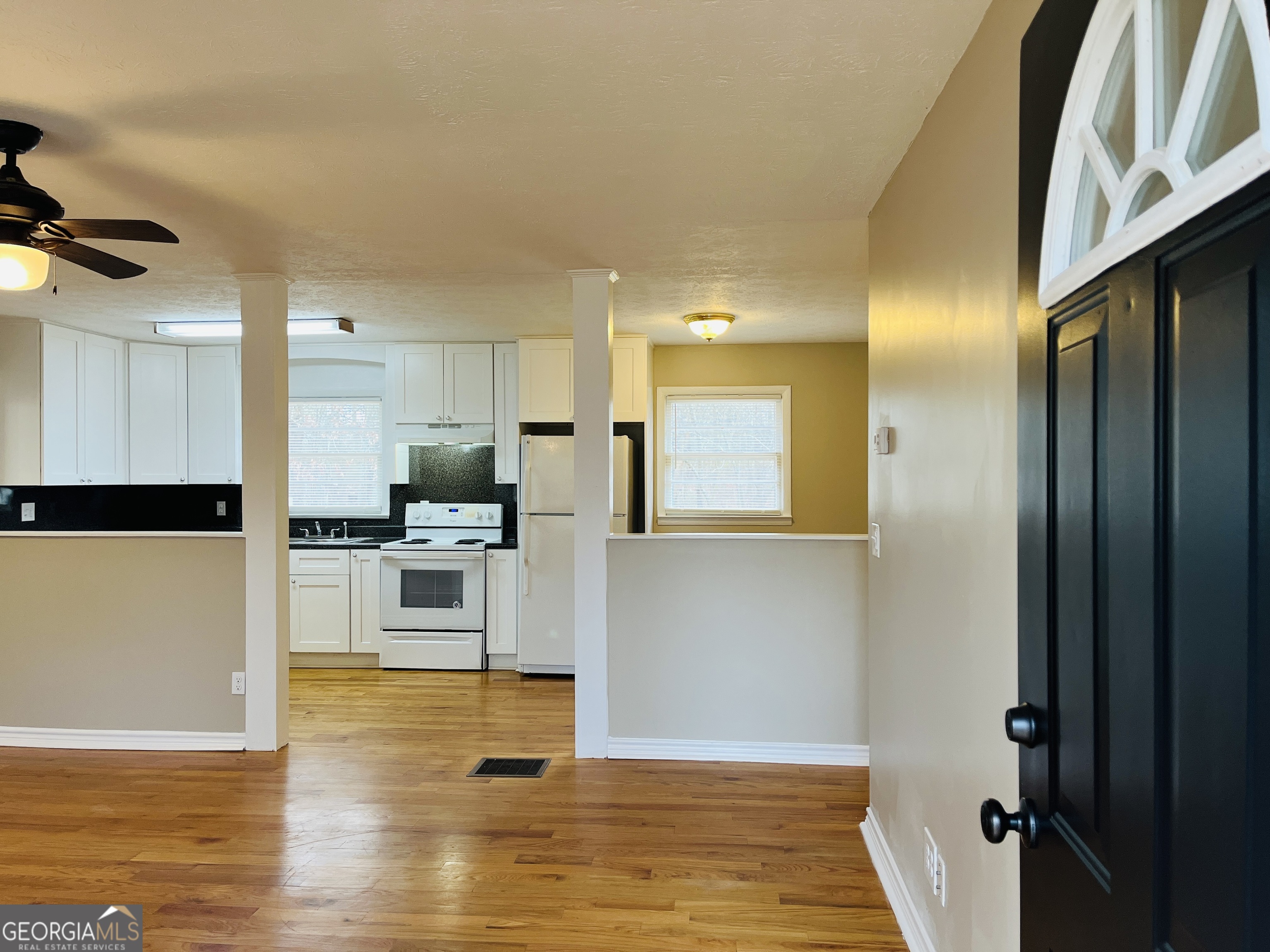 1085 Horsley Mill Road Carrollton, GA 30116 - Photo 3 of 26 a view of kitchen with wooden floor