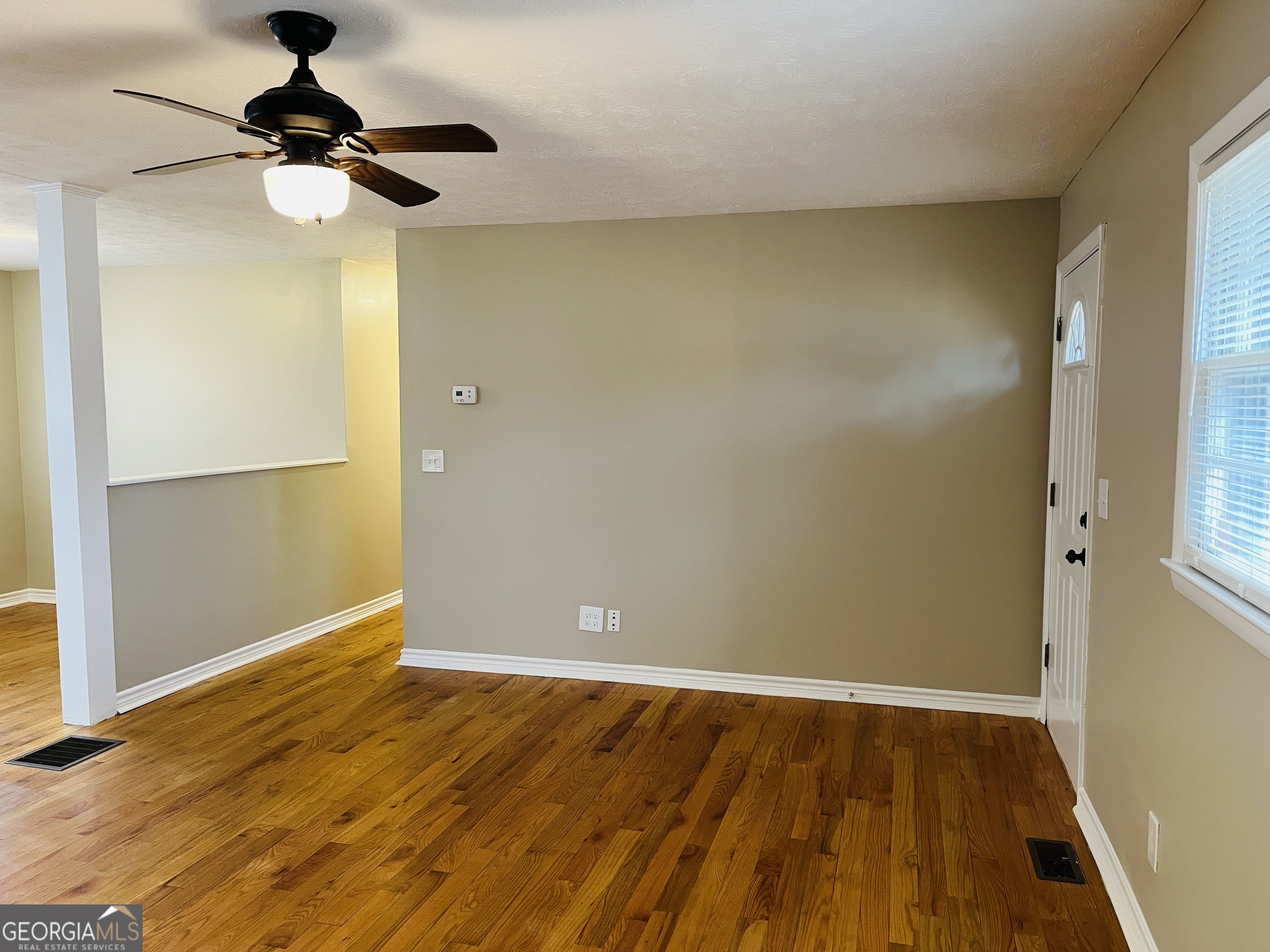 1085 Horsley Mill Road Carrollton, GA 30116 - Photo 5 of 26 a view of empty room with wooden floor