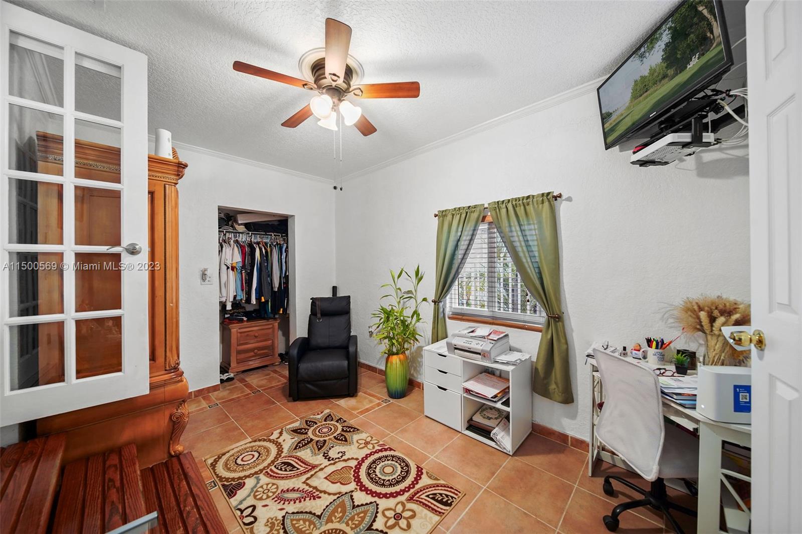 1828 Southwest 6th Street Miami, FL 33135 - Photo 13 of 50 a bedroom with furniture and a window