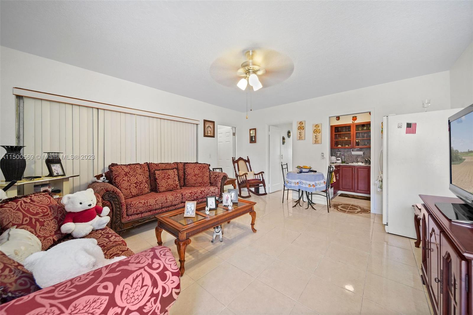1828 Southwest 6th Street Miami, FL 33135 - Photo 16 of 50 a living room with furniture and a wooden floor