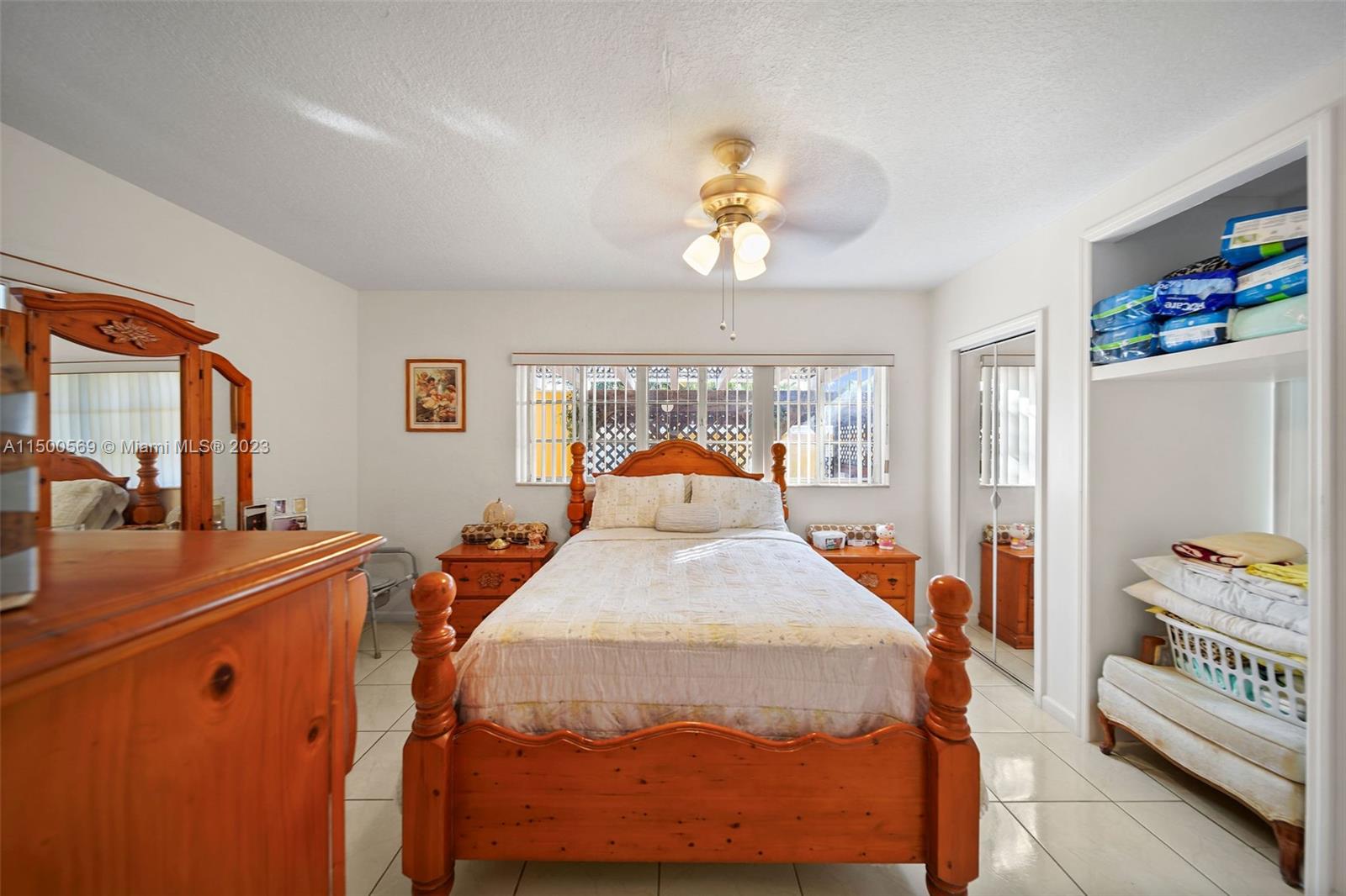 1828 Southwest 6th Street Miami, FL 33135 - Photo 19 of 50 a bedroom with bed and window