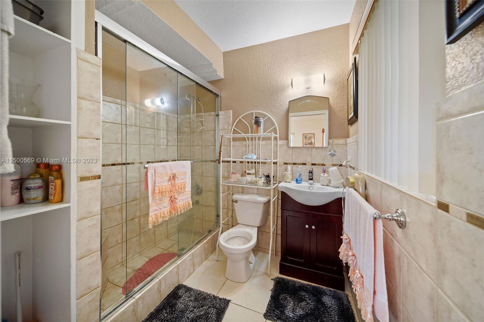 1828 Southwest 6th Street Miami, FL 33135 - Photo 20 of 50 a bathroom with a sink a toilet and shower