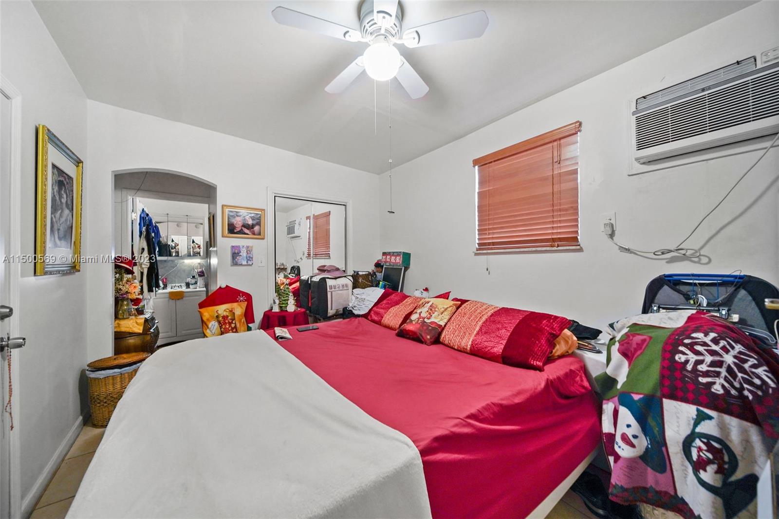 1828 Southwest 6th Street Miami, FL 33135 - Photo 24 of 50 a bedroom with a bed and closet