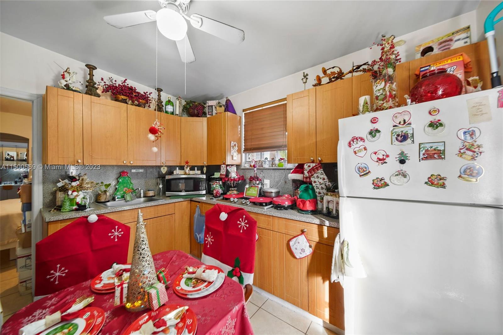 1828 Southwest 6th Street Miami, FL 33135 - Photo 25 of 50 a kitchen with a refrigerator and a stove