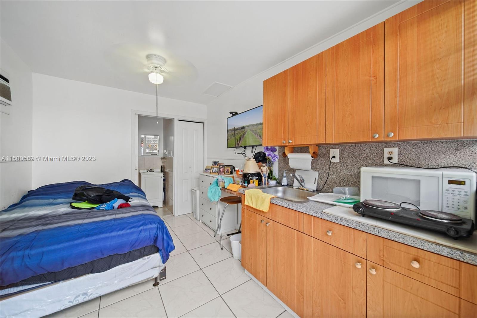 1828 Southwest 6th Street Miami, FL 33135 - Photo 29 of 50 a kitchen with a sink and cabinets