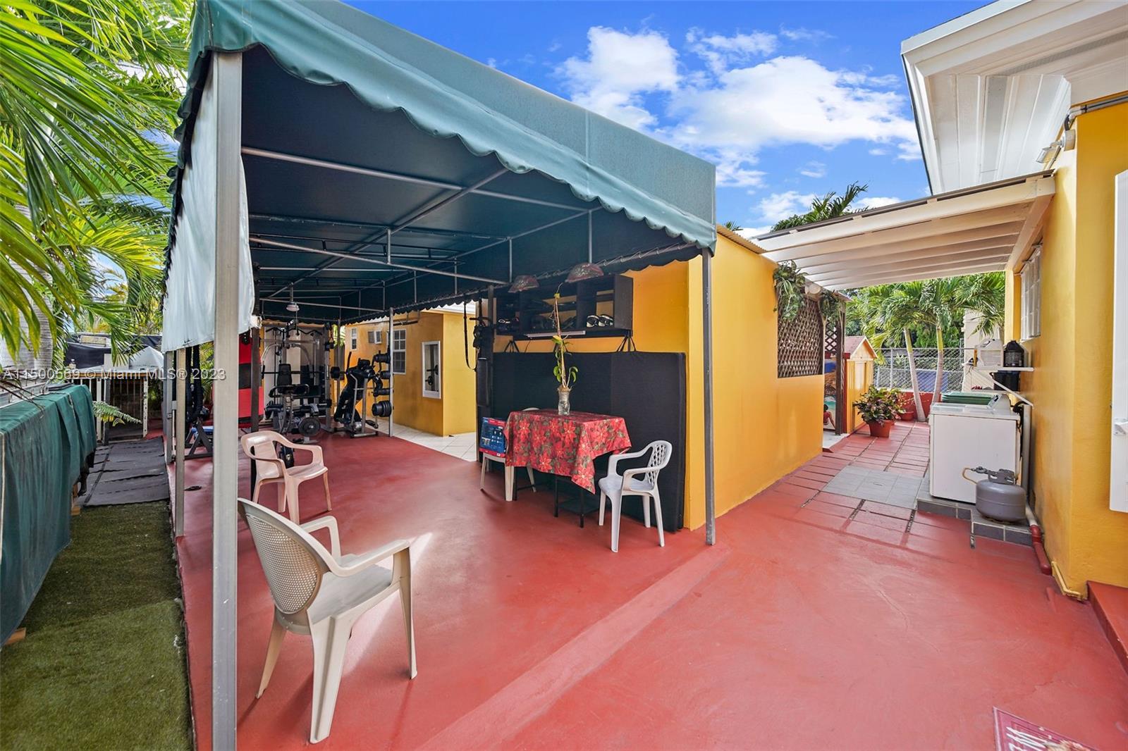 1828 Southwest 6th Street Miami, FL 33135 - Photo 42 of 50 a view of chairs and tables in patio