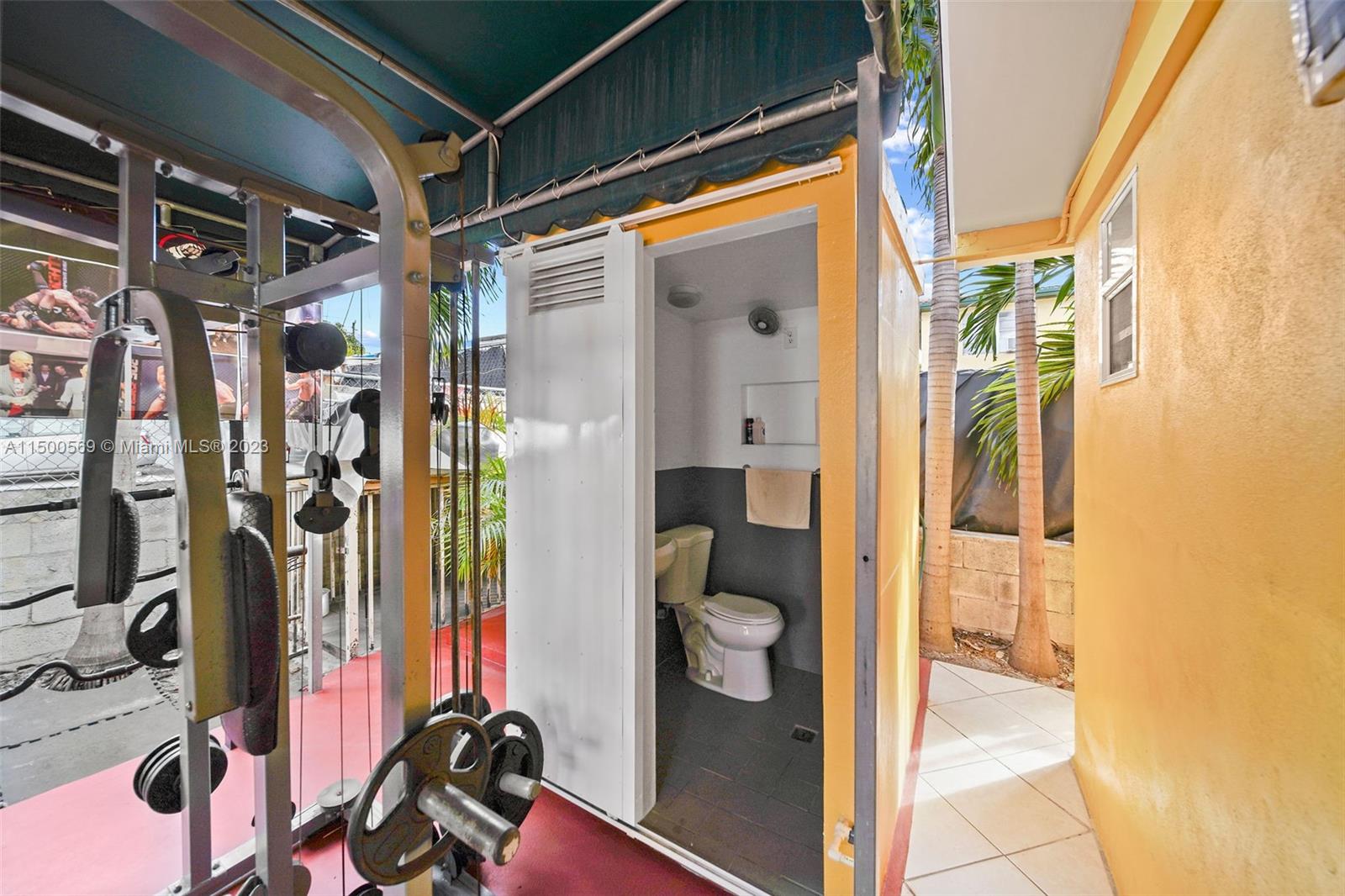 1828 Southwest 6th Street Miami, FL 33135 - Photo 43 of 50 a view of walk in closet with clothes and shoes